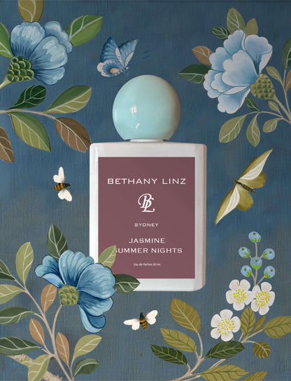 Perfume bottle labeled 'Bethany Linz' on a floral background